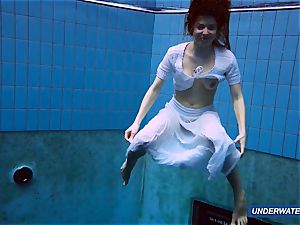 extraordinaire fur covered underwatershow by Marketa