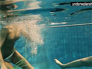 two wonderful amateurs showing their bodies off under water
